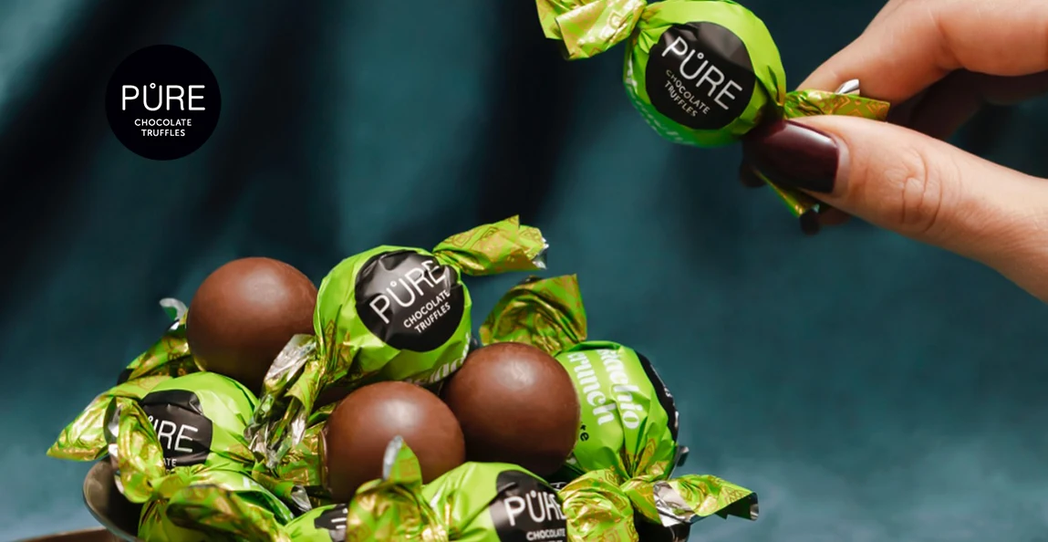 Iegādājies Pure Chocolate konfektes un saņem piena šokolādes trifeles 