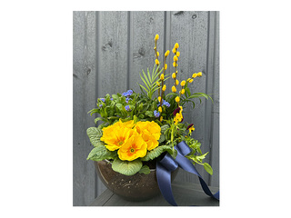 Pavasara kompozīcija stikla traukā